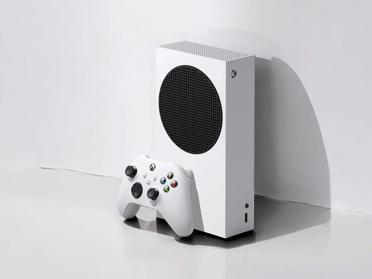 Xbox Series S 512GB SSD Console showcasing its compact design and sleek aesthetics, highlighting features like the front view and controller